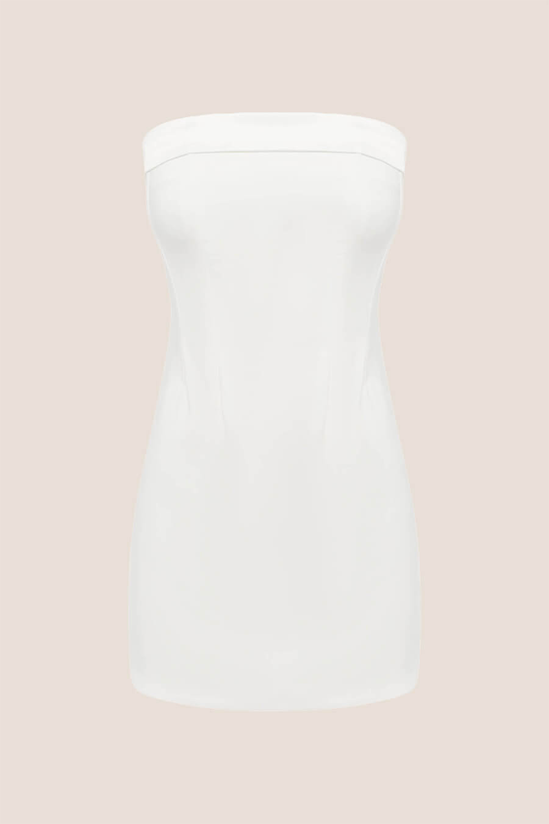 The Chloe Corset Dress by With Jean is showcased on a plain beige background, featuring a white strapless mini design with a fitted, simple silhouette and a straight neckline—an elegant option for formal evening occasions.